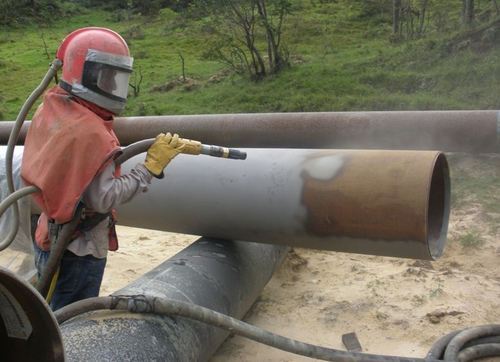 sand blasting of pipe 01